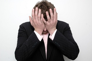 Spreadsheets getting you down? frustrated businessman